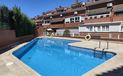 Swimming pool of Duplex for sale in Sevilla la Nueva  with Heating, Parquet flooring and Storage room