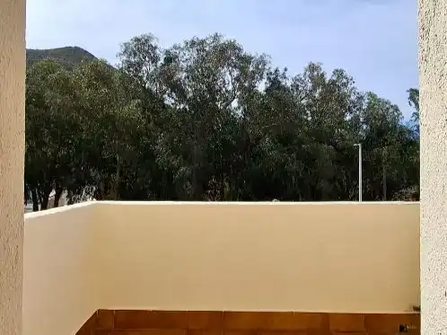 Vista exterior de Casa adosada en venda en Níjar amb Aire condicionat, Piscina i Balcó