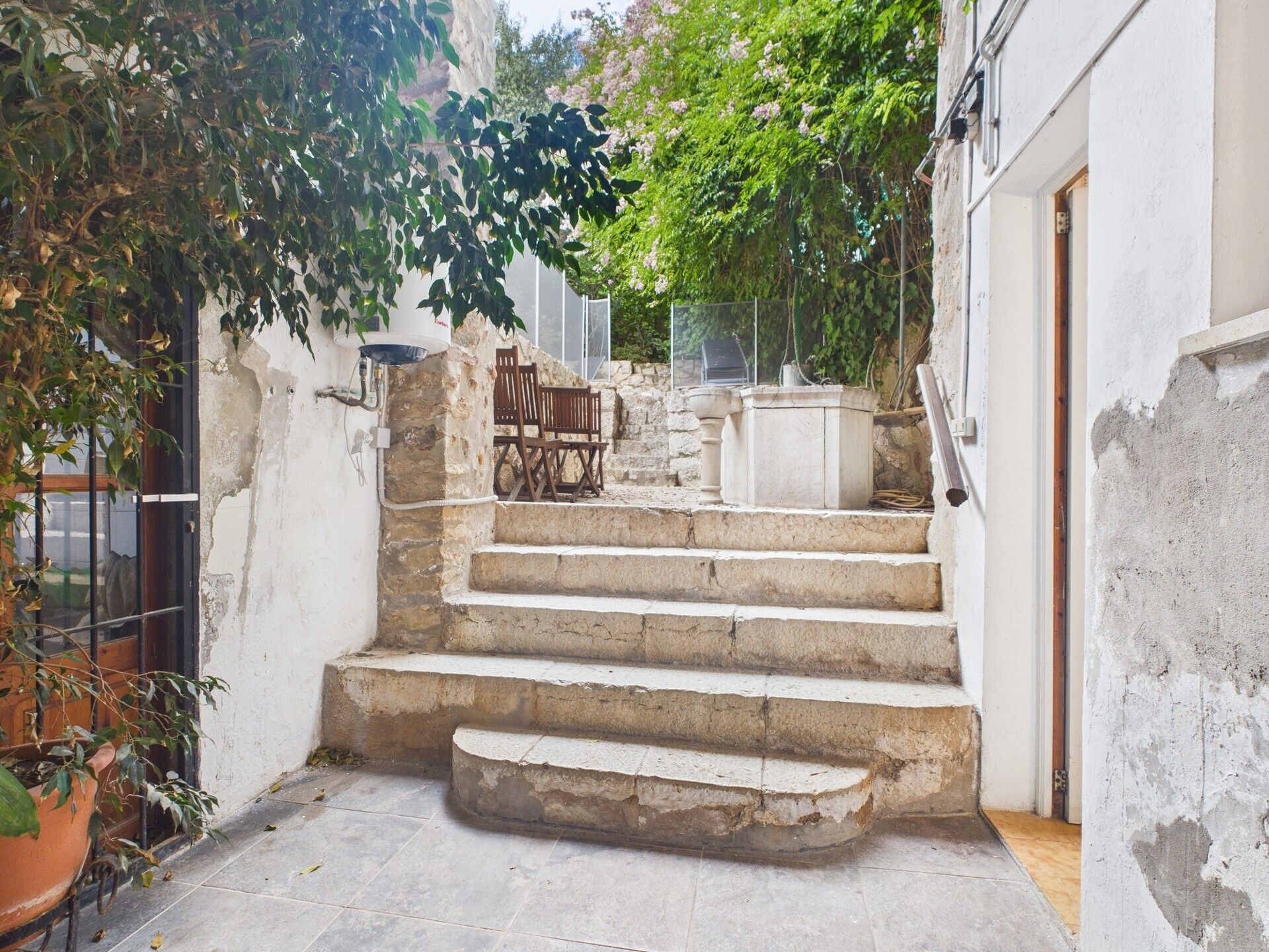 Exterior view of Single-family semi-detached for sale in Lloseta  with Air Conditioner, Private garden and Storage room