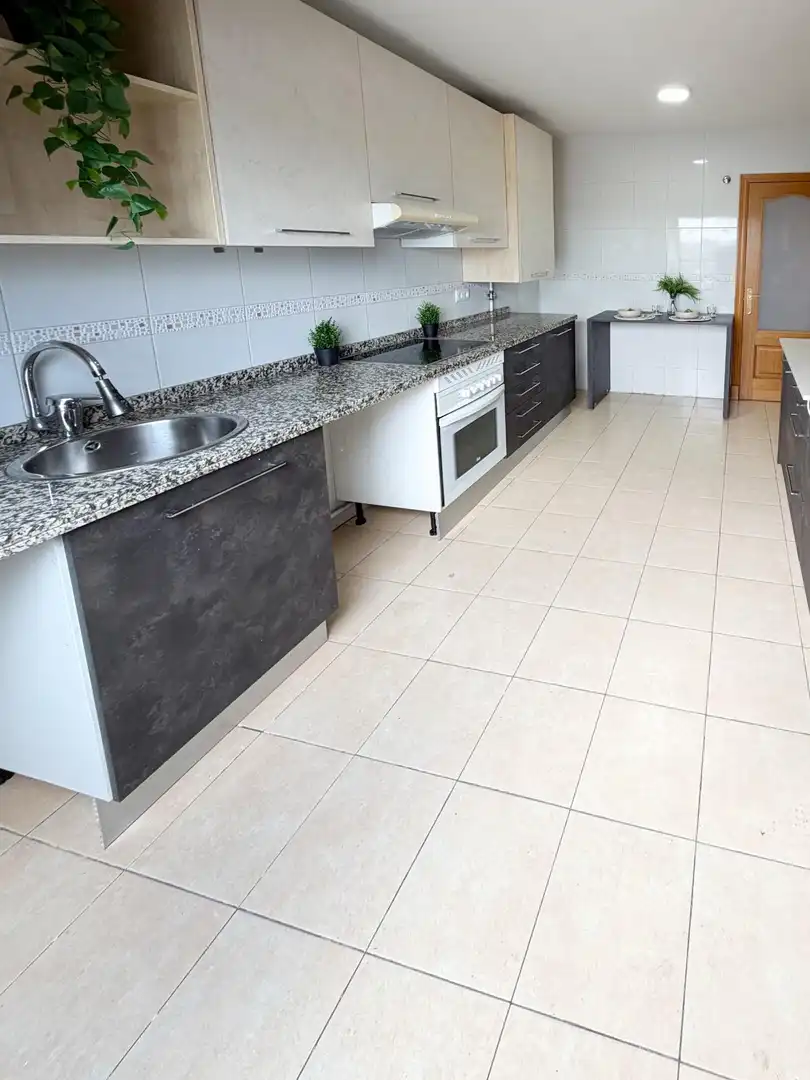 Kitchen of Attic for sale in Oviedo   with Heating, Parquet flooring and Storage room