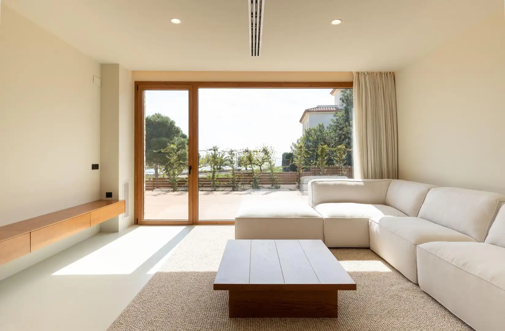 Sala de estar de Casa o chalet en venta en L'Ampolla con Aire acondicionado, Calefacción y Jardín privado