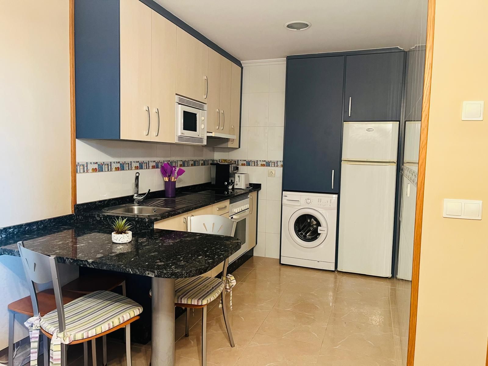 Cuina de Apartament en venda en Sanxenxo amb Aire condicionat, Calefacció i Jardí privat