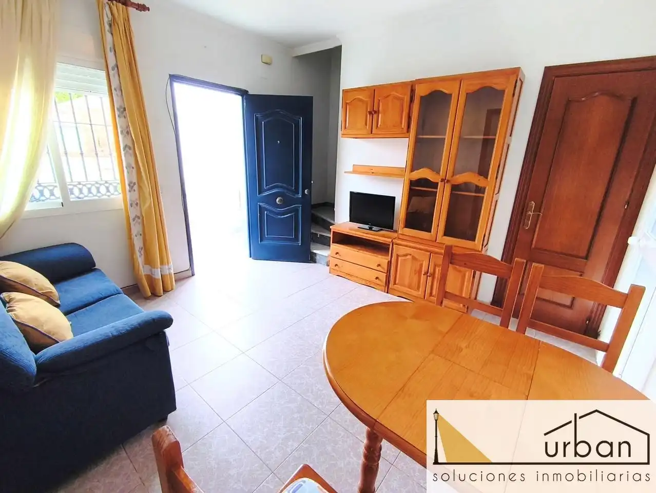 Sala de estar de Casa adosada en venta en Chipiona