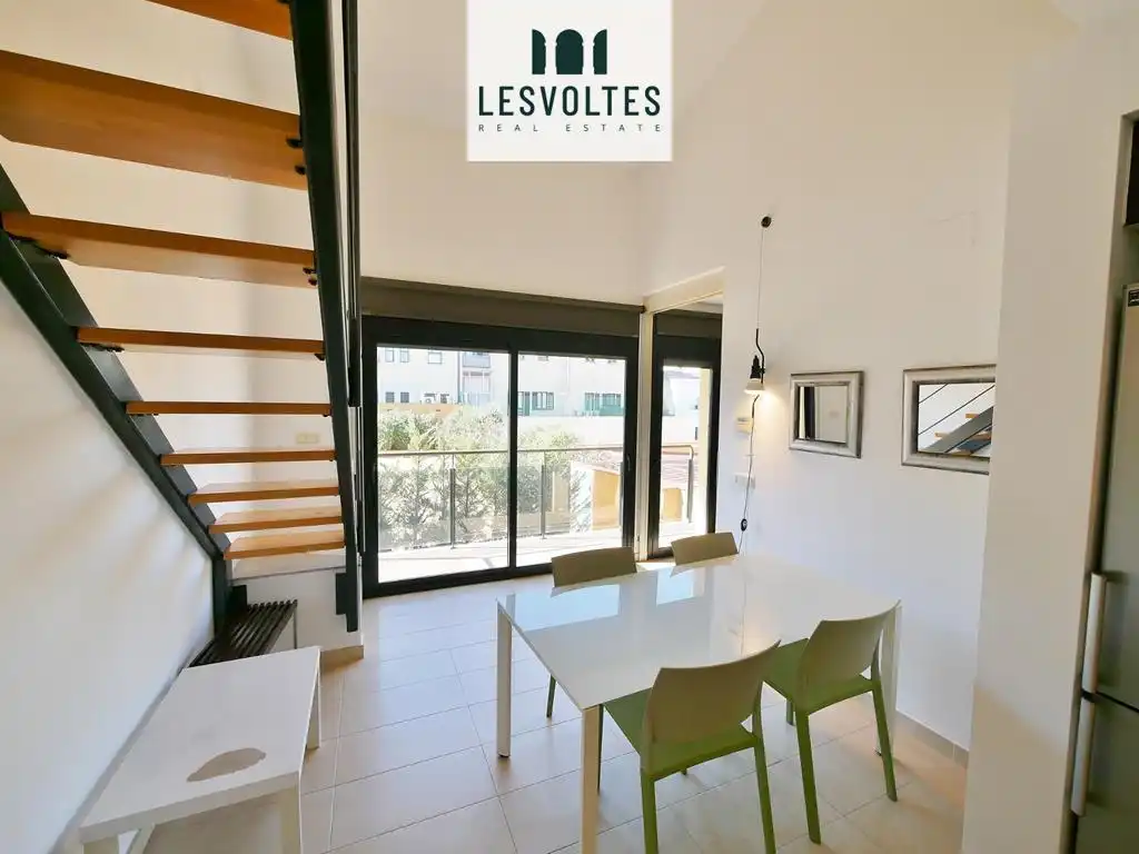 Sala de estar de Piso en venta en La Bisbal d'Empordà con Calefacción, Terraza y Amueblado