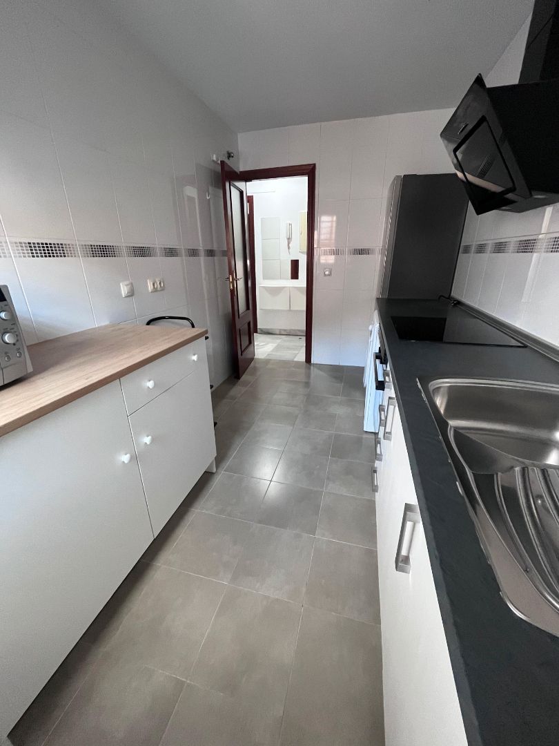 Kitchen of Flat to rent in Coria del Río  with Air Conditioner and Furnished
