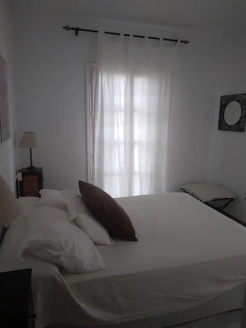 Habitación de Casa adosada en venta en Chiclana de la Frontera con Jardín privado y Piscina comunitaria