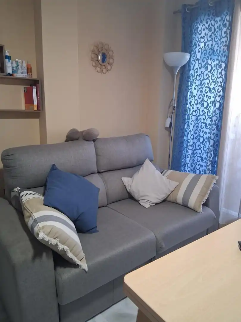 Sala d'estar de Apartament en venda en Roquetas de Mar amb Aire condicionat, Terrassa i Moblat