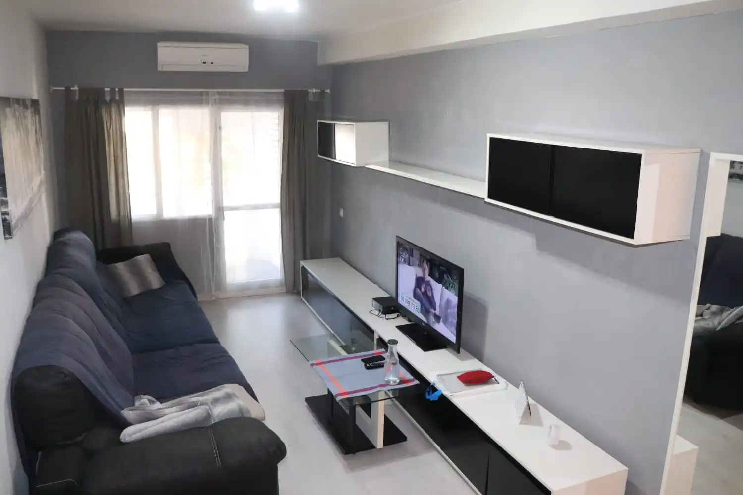 Sala de estar de Piso de alquiler en San Juan de Aznalfarache con Aire acondicionado y Amueblado