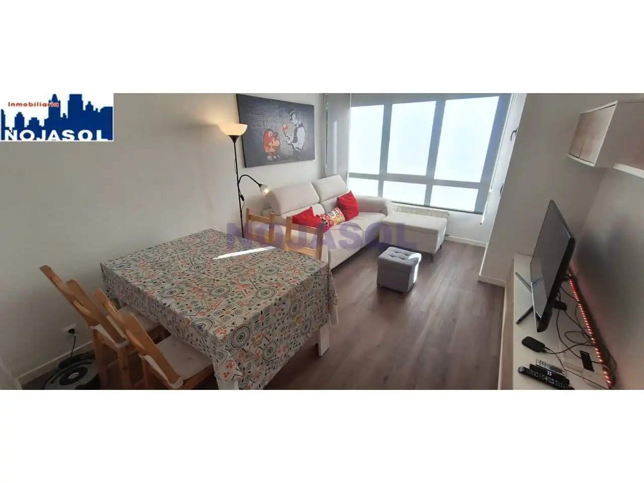 Sala de estar de Apartamento de alquiler en Noja con Calefacción, Parquet y Terraza