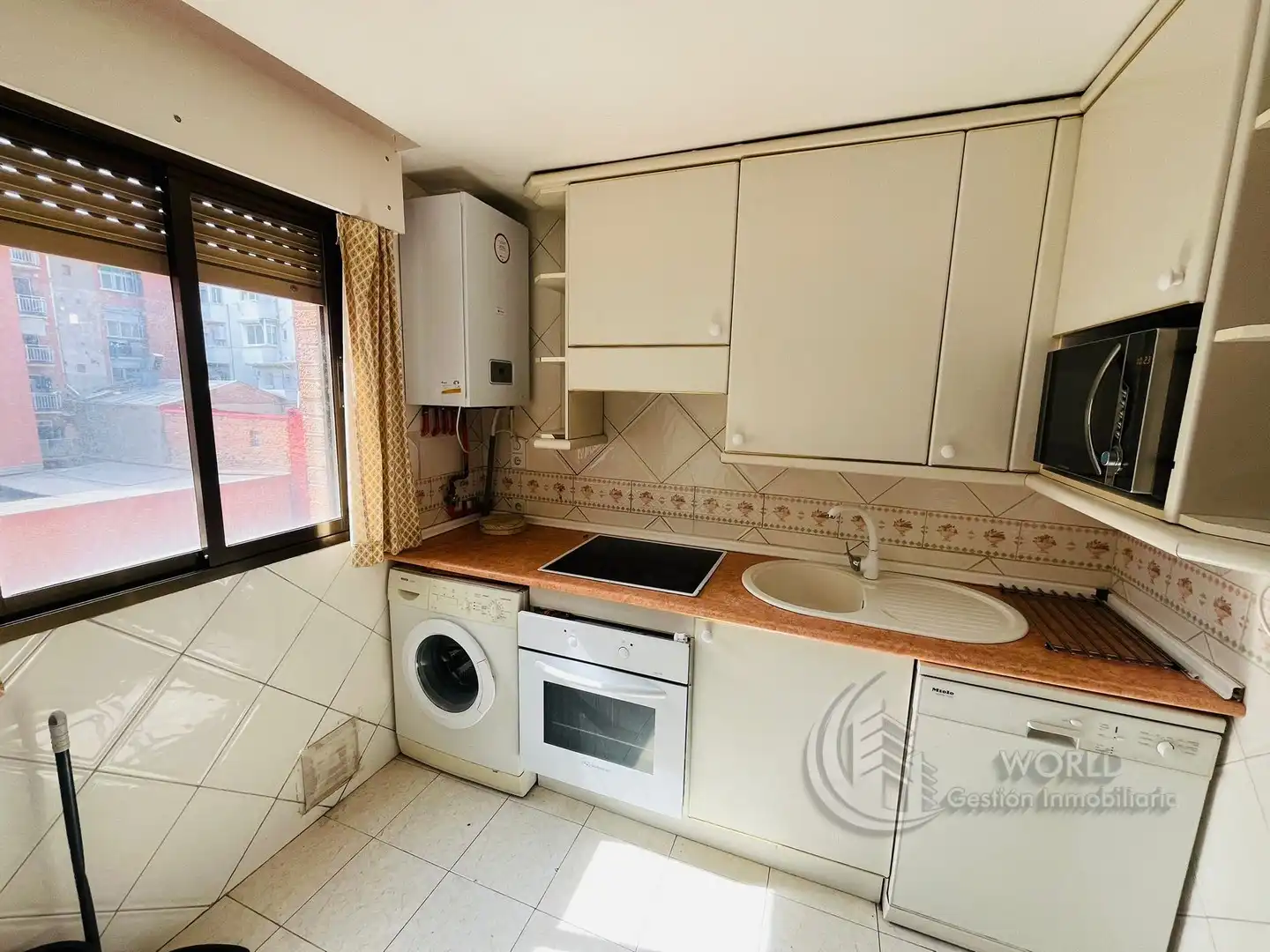 Kitchen of Attic for rent in Madrid  with Air Conditioner, Heating and Terrace