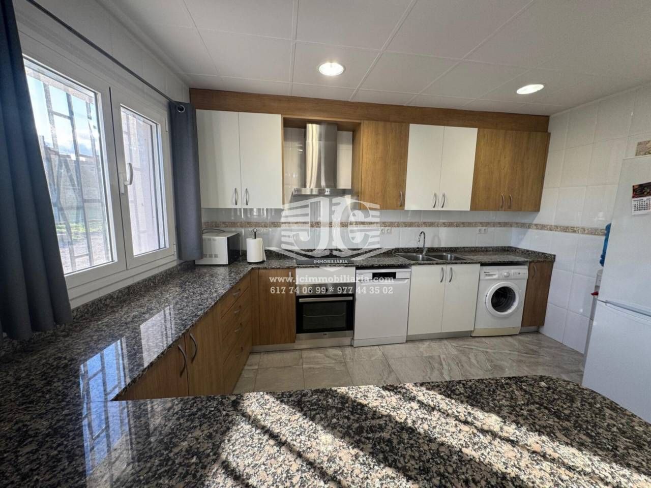 Cuina de Casa adosada de lloguer en Roquetes amb Aire condicionat, Moblat i Piscina comunitària