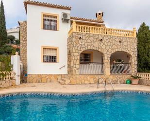 Swimming pool of House or chalet for sale in Sanet y Negrals  with Air Conditioner, Heating and Private garden