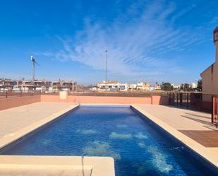 Swimming pool of Single-family semi-detached for sale in Los Alcázares  with Air Conditioner, Heating and Terrace