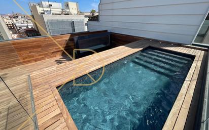 Swimming pool of Attic for sale in  Barcelona Capital  with Air Conditioner, Heating and Private garden