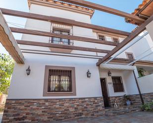 Exterior view of Single-family semi-detached for sale in Guillena  with Air Conditioner, Heating and Private garden