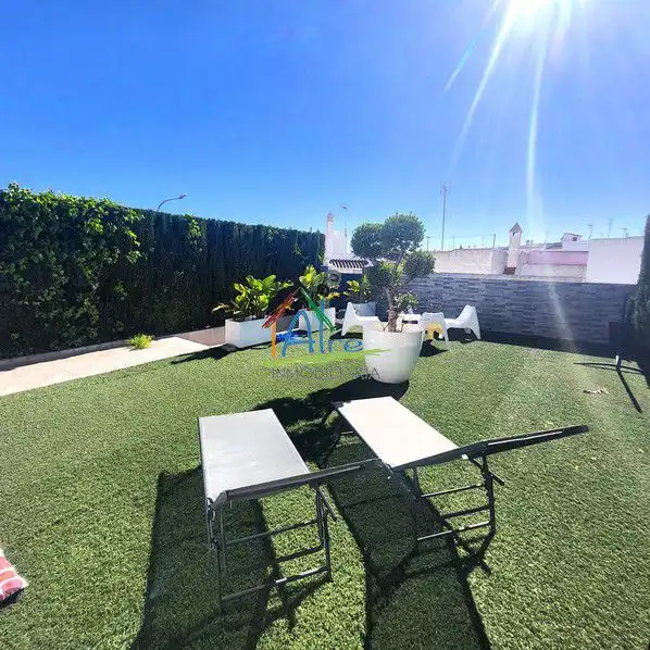 Terrassa de Casa adosada en venda en Almonte amb Aire condicionat, Calefacció i Jardí privat