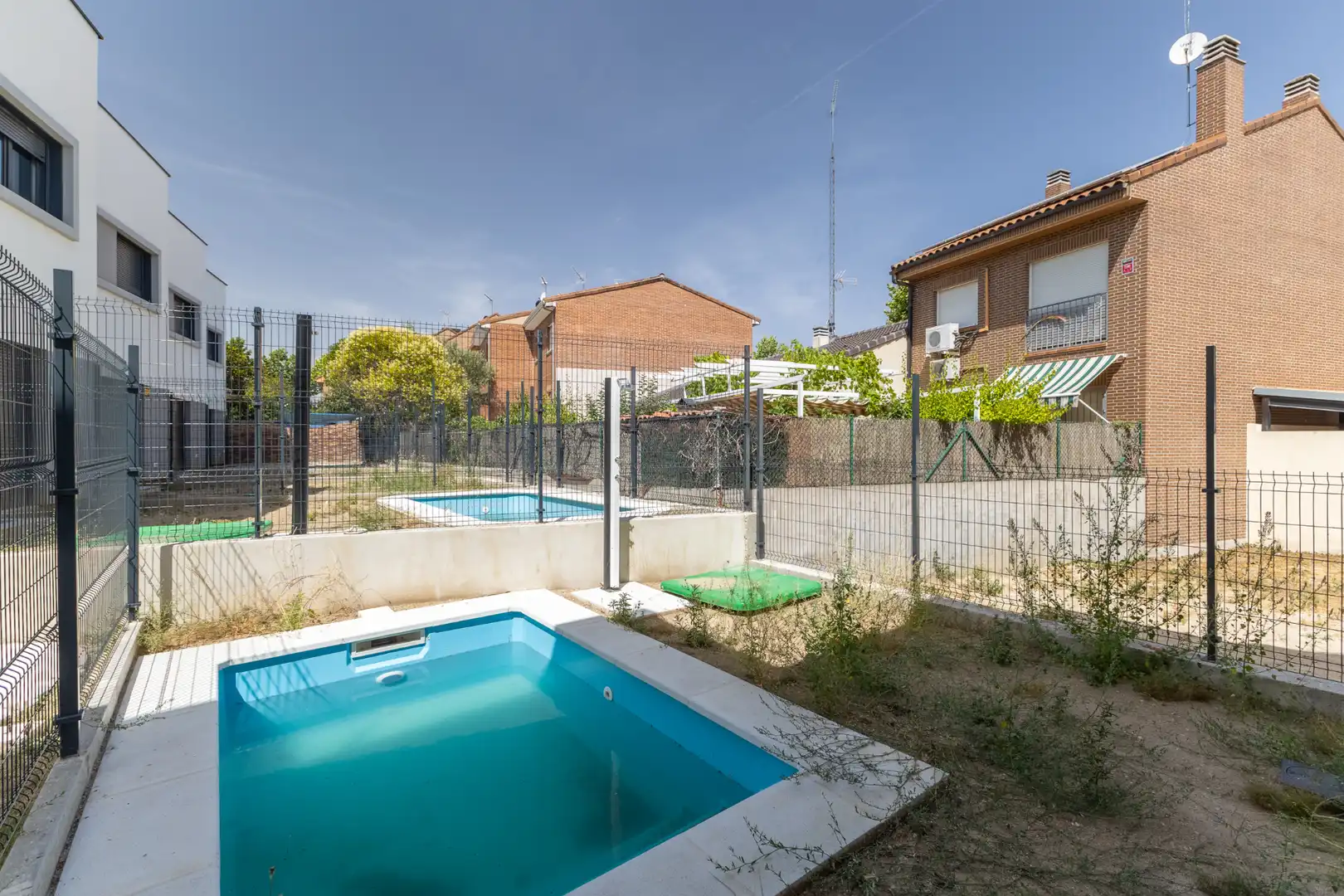 Piscina de Casa adosada en venda en Villanueva del Pardillo amb Aire condicionat, Jardí privat i Terrassa