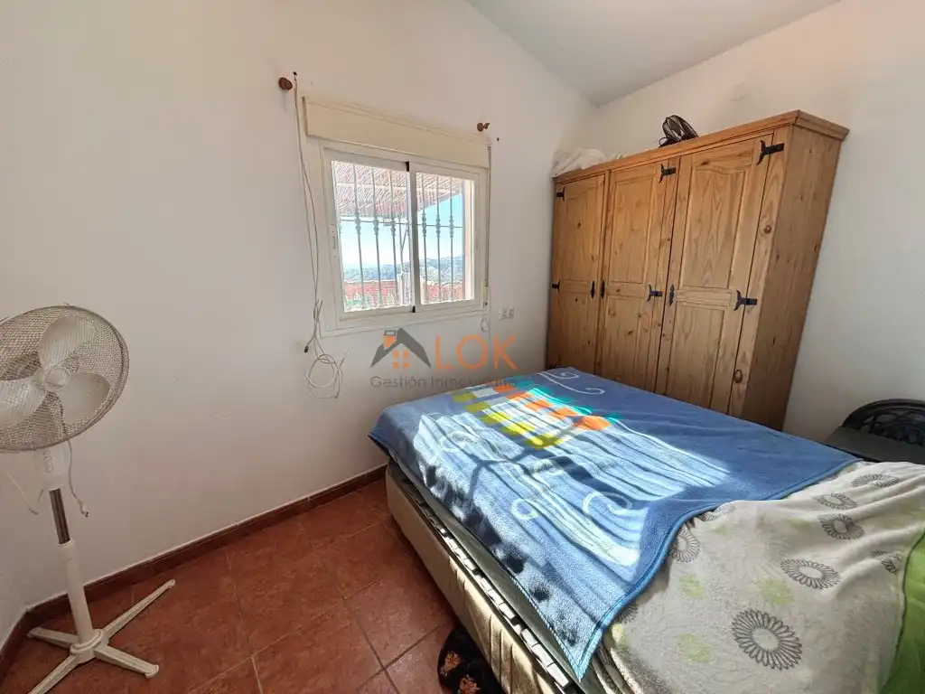 Bedroom of Houses for sale in El Borge  with Terrace and Swimming Pool