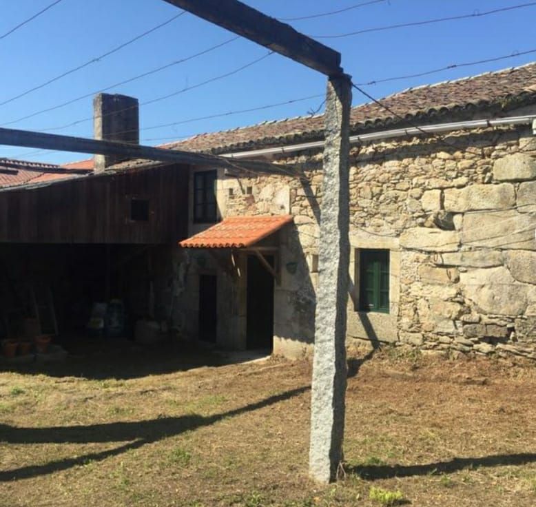 Vista exterior de Casa o xalet en venda en Moraña amb Jardí privat