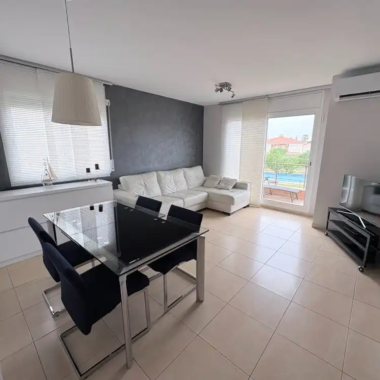 Sala d'estar de Apartament en venda en Mont-roig del Camp amb Aire condicionat, Moblat i Piscina comunitària