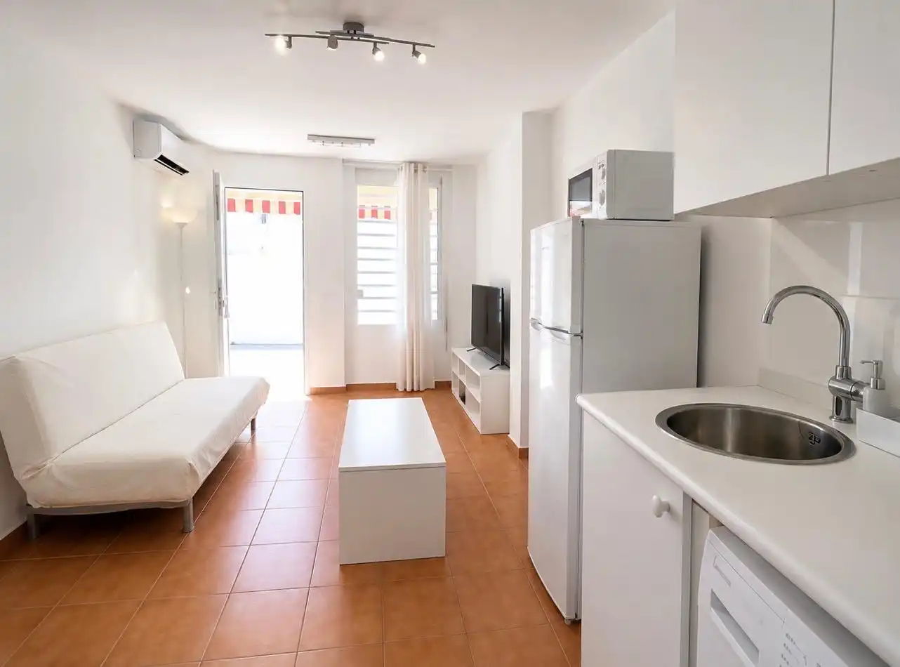 Sala d'estar de Planta baixa en venda en Torremolinos amb Aire condicionat, Calefacció i Jardí privat