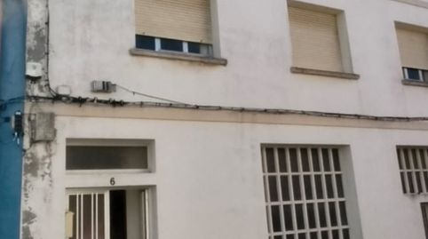 **EDIFICIO DE TRES PLANTAS CON GRAN GARAJE EN CARIÑO**