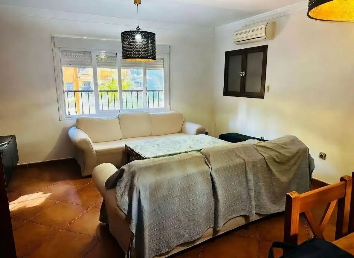 Sala de estar de Casa adosada en venta en Campo de Mijas