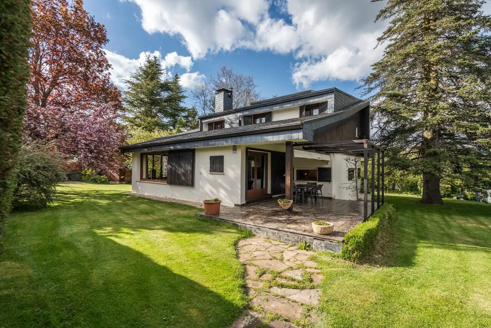 Vista exterior de Casa o chalet en venta en El Espinar con Calefacción, Jardín privado y Terraza