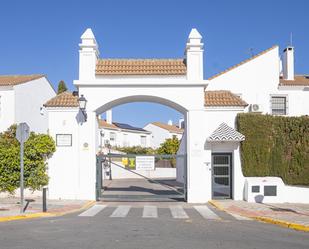 Exterior view of Single-family semi-detached for sale in Tomares  with Air Conditioner, Heating and Private garden