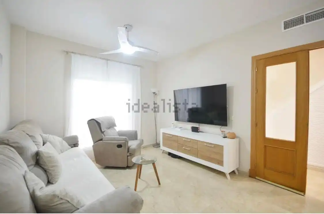 Sala de estar de Casa adosada en venta en Jerez de la Frontera con Aire acondicionado