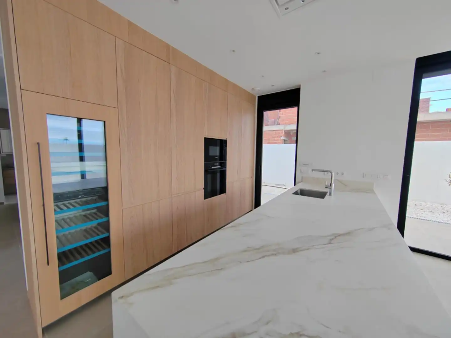 Cocina de Casa o chalet en venta en Sant Joan d'Alacant con Aire acondicionado, Calefacción y Jardín privado