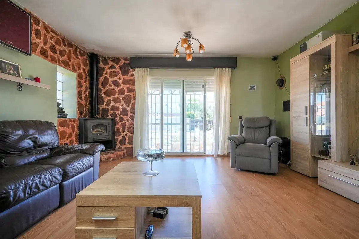 Sala de estar de Casa adosada en venta en Pioz con Aire acondicionado, Calefacción y Jardín privado