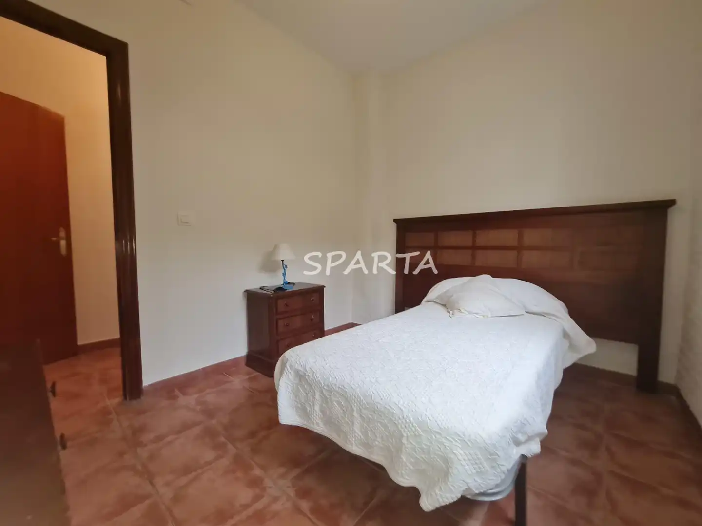 Schlafzimmer von Country house zum Verkauf in Sanlúcar la Mayor mit Privatgarten, Schwimmbad und Ofen