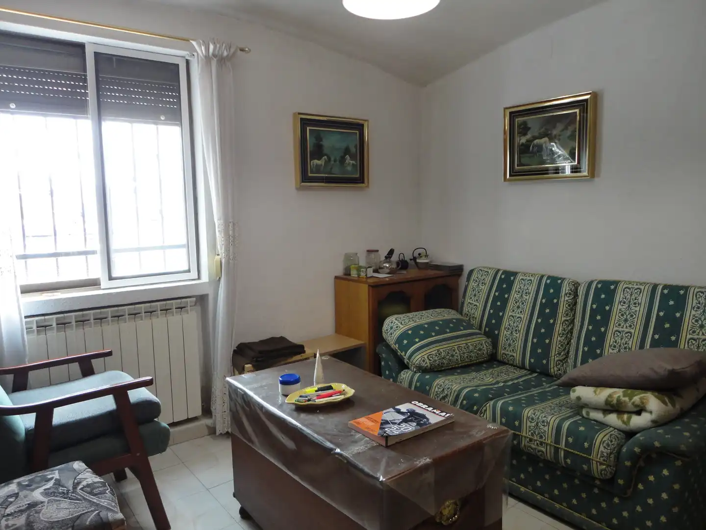 Sala de estar de Casa adosada en venta en Olmedo con Calefacción, Jardín privado y Terraza