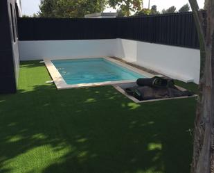 Swimming pool of Planta baja for sale in Santa Eulària des Riu  with Air Conditioner, Heating and Private garden