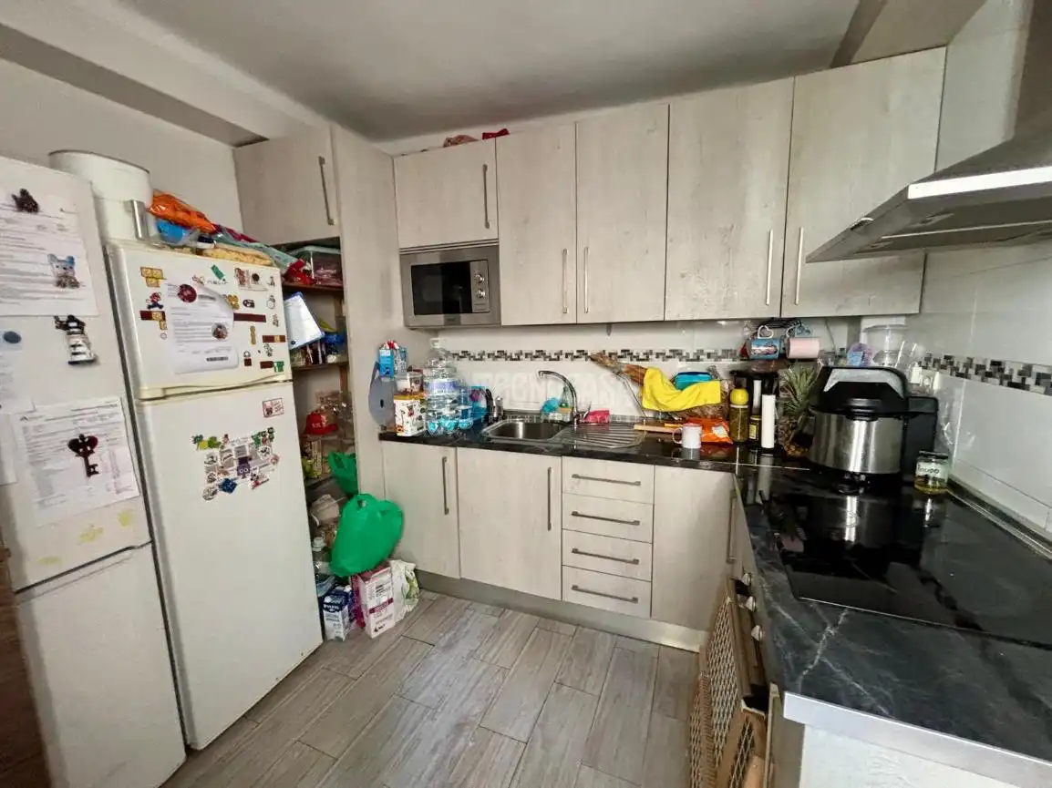 Cuina de Casa adosada en venda en Málaga amb Terrassa i Traster