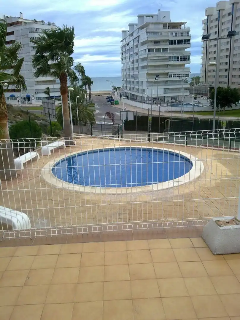 Schwimmbecken von Einfamilien-Reihenhaus zum Verkauf in Cullera mit Klimaanlage, Terrasse und Möbliert