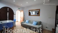 Sala d'estar de Casa adosada en venda en Miramar amb Aire condicionat i Terrassa