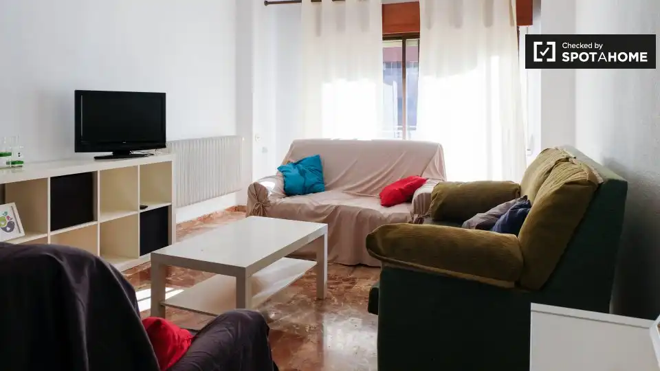 Sala d'estar de Apartament per a compartir en Granada amb Aire condicionat, Terrassa i Moblat