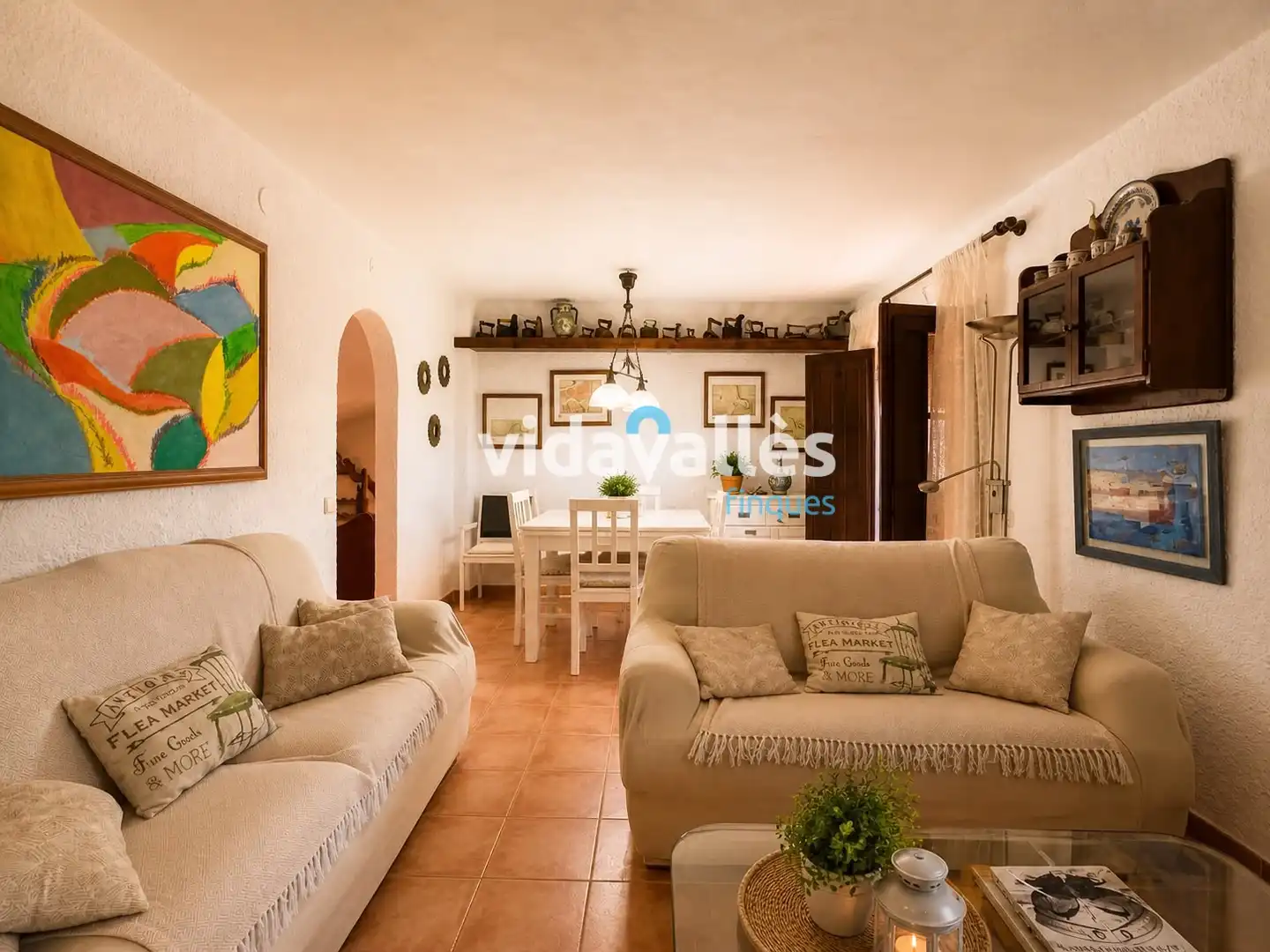 Sala d'estar de Casa adosada en venda en Calonge i Sant Antoni amb Jardí privat, Terrassa i Internet