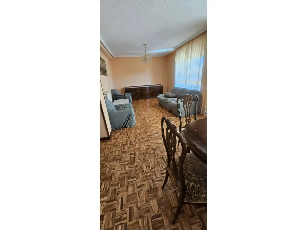Sala de estar de Casa adosada en venta en Sariegos con Calefacción, Parquet y Terraza