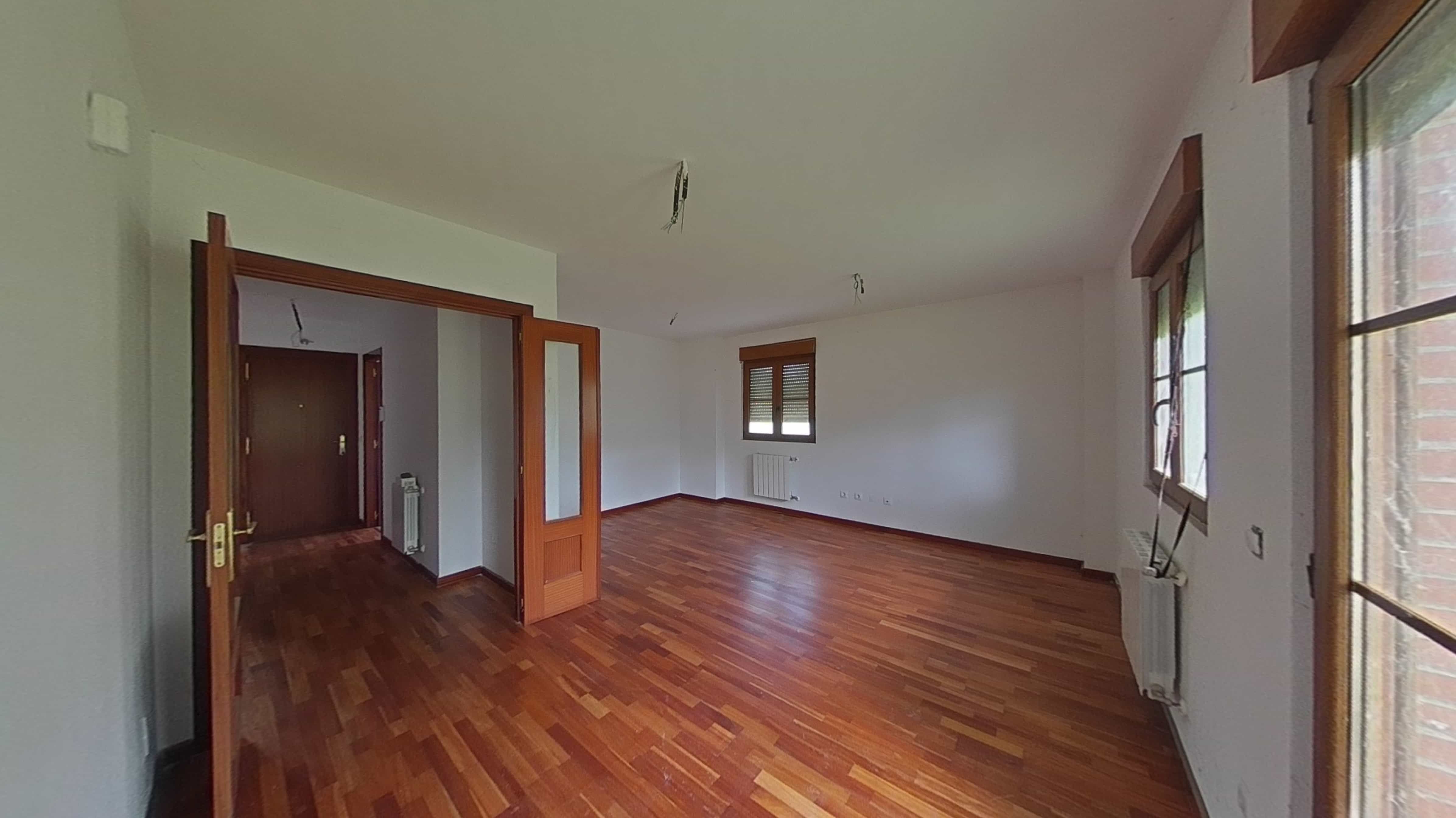 Sala d'estar de Casa adosada en venda en Castañeda amb Calefacció, Parquet i Traster