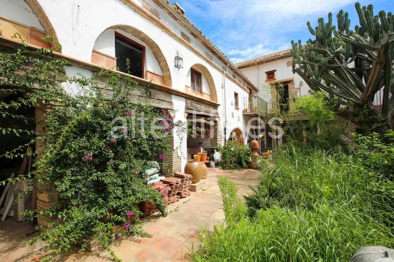 Garten von Einfamilien-Reihenhaus zum Verkauf in Gandia mit Privatgarten, Terrasse und Abstellraum