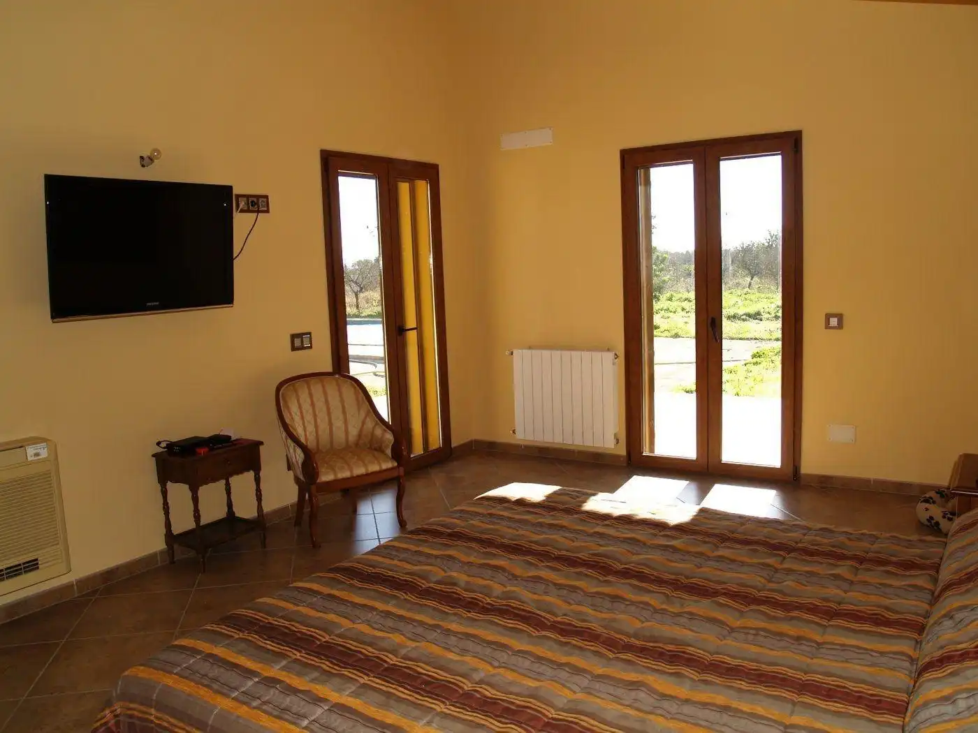 Sala de estar de Finca rústica en venta en  Palma de Mallorca con Aire acondicionado, Calefacción y Jardín privado