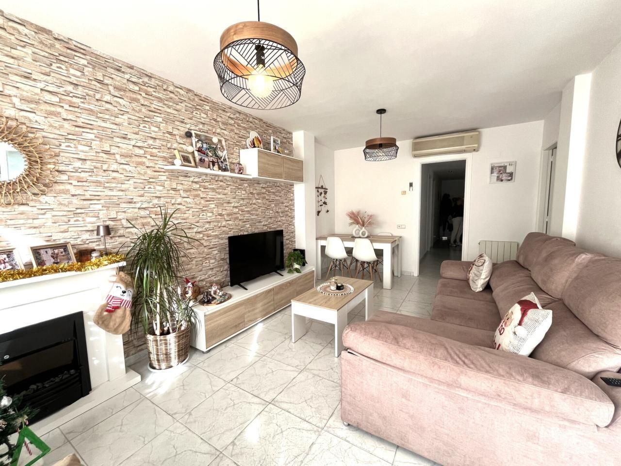 Sala d'estar de Apartament en venda en Sant Feliu de Guíxols amb Calefacció