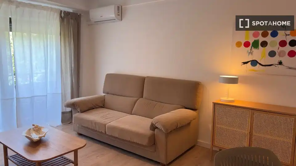 Sala de estar de Apartamento para compartir en Valencia con Aire acondicionado, Terraza y Amueblado