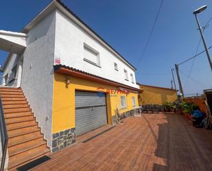 Exterior view of Single-family semi-detached for sale in Riudarenes  with Air Conditioner, Terrace and Swimming Pool