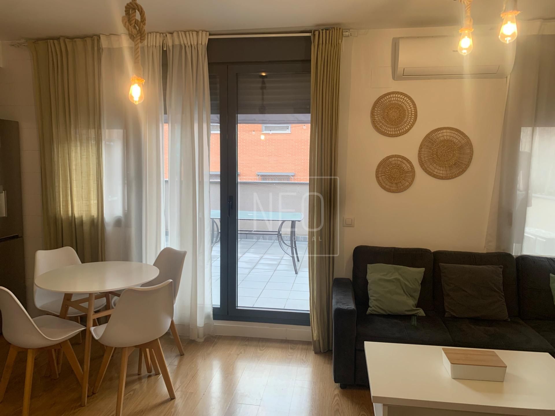 Living room of Attic for sale in  Madrid Capital  with Air Conditioner, Heating and Terrace