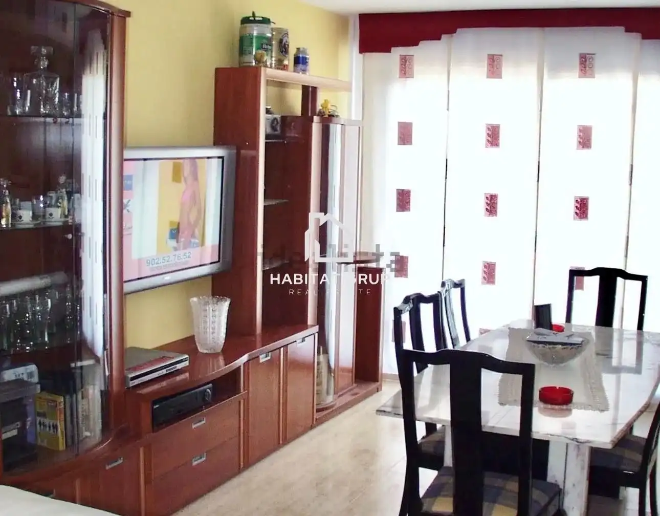 Sala d'estar de Casa adosada en venda en L'Ampolla amb Aire condicionat, Calefacció i Jardí privat