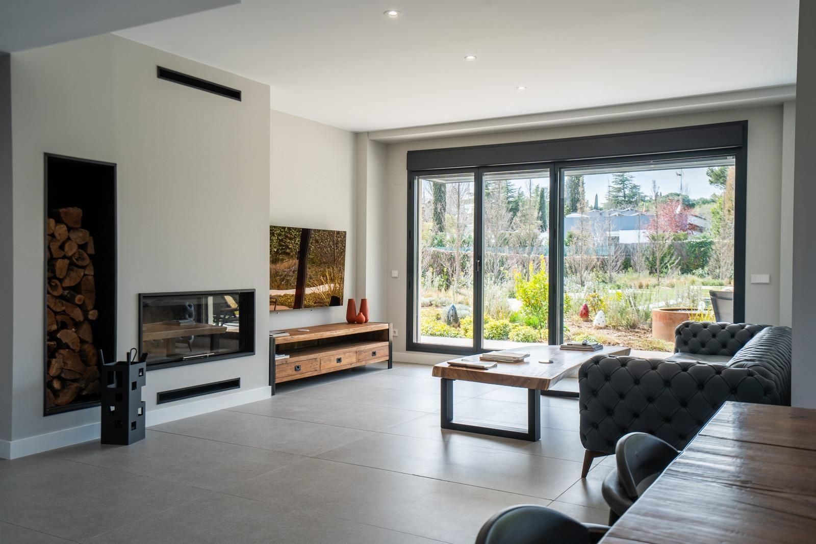 Sala d'estar de Casa o xalet en venda en Villanueva de la Cañada amb Calefacció, Jardí privat i Terrassa